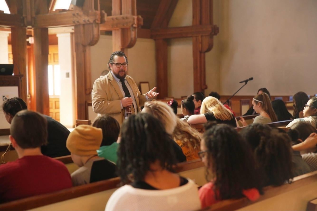 Dr. Koberstien teaching class in the Chapel