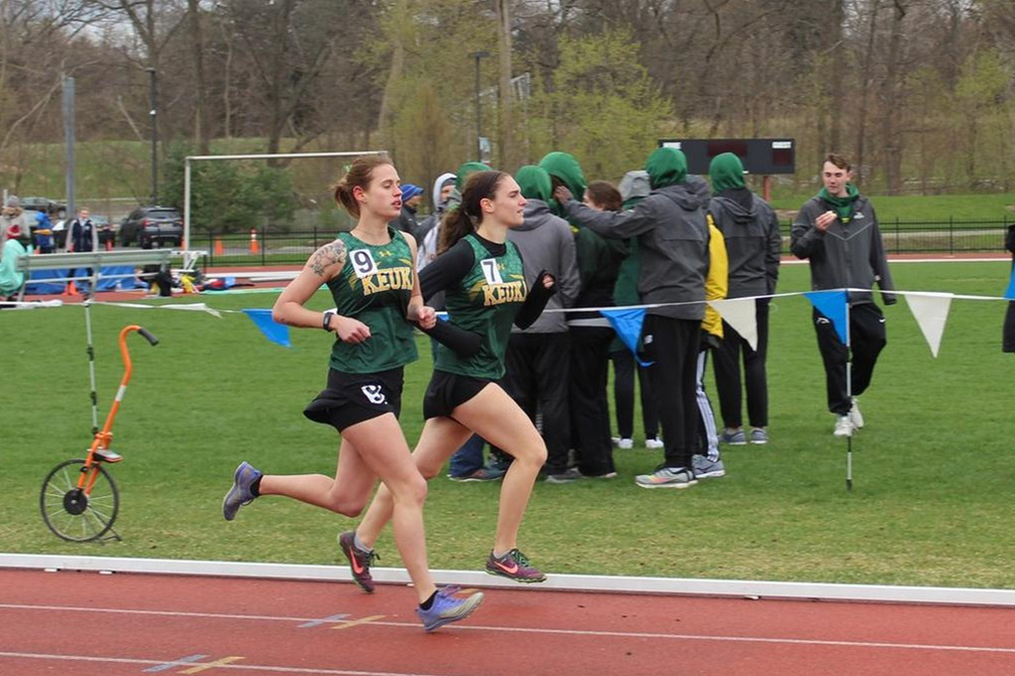 Two Keuka College Students racing on a track