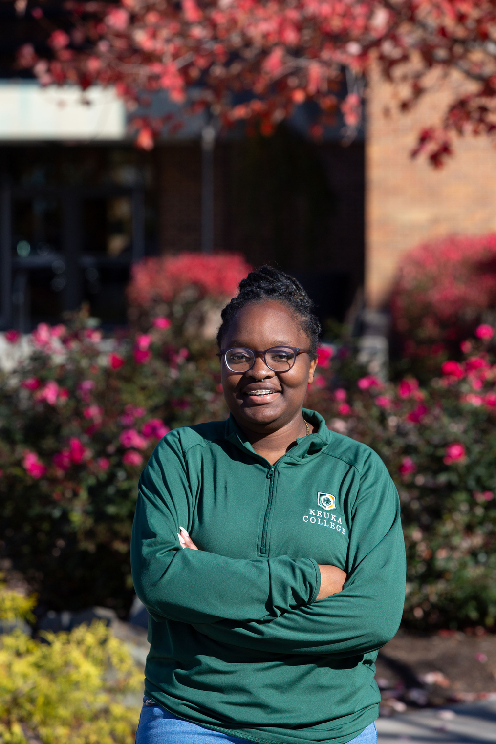 Kameisha Reid '25 outside of Hegeman Hall at Fall Open House